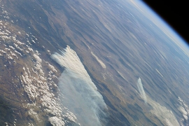 Aerosols can lower surface temperatures either directly, by reflecting sunlight skyward, or indirectly, by increasing the reflectivity of clouds.