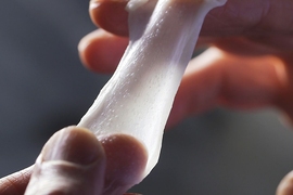 The "artificial skin" developed by MIT Professor Ioannis Yannas is known as Integra. Its development is chronicled in the film "Hope Regenerated."