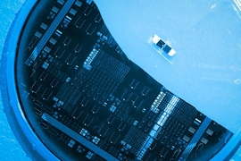 A silicon solar cell with silicon-germanium filter using a step-cell design (large) and a gallium arsenide phosphide layer on silicon step-cell proof-of-concept solar cell (small).