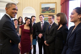 President Barack Obama speaks with the Office of Science and Technology Policy Social and Behavioral Sciences team in the Oval Office.