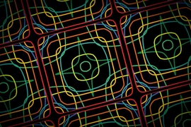 This image shows simulated iso-frequency contours of a photonic crystal slab superimposed on each other and tiled.