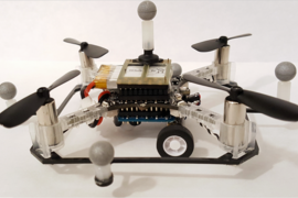 One of the researchers' quadcopter drones with wheels.