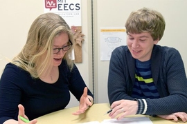 Graduate students Samantha Dale Strasser and Greg Stein are among the trained advisors working in the EECS Communication Lab.