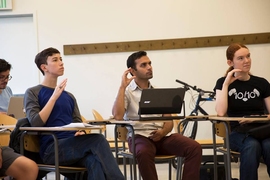 Members of the American Sign Language and Deaf Culture Club practice signs in a recent class.