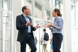 David Autor (left), a professor economics, and Asu Ozdaglar, a professor of electrical engineering, discuss 6-14: Computer Science, Economics, and Data Science. The new major is designed to train students to become the unseen game-makers behind virtual markets.