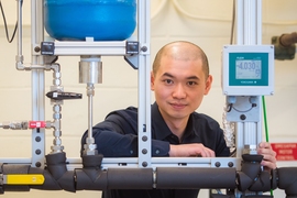 Guanyu Su, MIT graduate student in nuclear science and engineering, is examining multi-scale physics in annular flow heat transfer using advanced diagnostics.