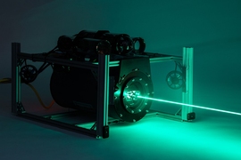 A remotely operated vehicle and undersea terminal emits a coarse acquisition stabilized beam after locking onto another lasercom terminal.