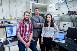 Left to right: Graduate student Cédric Viry, Professor Jeffrey Grossman, and postdoc Grace Han, along with their collaborators, are using specially designed “photoswitching” molecules to control the release of heat from materials used to store thermal energy in devices ranging from solar concentrators and solar cookers to heated seats in vehicles.