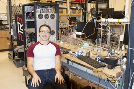 PhD student Josh Moss works in the Parsons Laboratory, where he focuses on organic chemical reactions in the atmosphere that contribute significantly to smog formation.