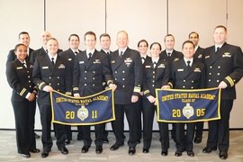 Students enrolled in the MIT Course 2N program who also graduated from the U.S. Naval Academy pose with Rear Admiral Brian Antonio, a curriculum sponsor for the program. 