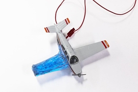 Using the 3D printing method developed by the MIT researchers, a structure such as this model airplane wing could have both light emitters and light detectors embedded in the material, so that it could continuously detect any micro-cracks as they begin to form.