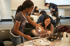 MIT students explore the practical application of electromagnetic concepts through 8.02 (Electricity and Magnetism) class experiments.