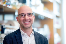 Jonathan Weissman stands in his lab. 