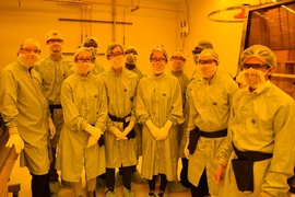 Students from the first academic course to use MIT.nano's facilities pose in the facility's soft lithograpy space with technical instructor Scott Poesse (left).