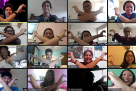 Four by four grid of first-year students crossing their arms in a team-building exercise on Zoom