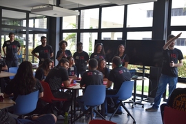 research papers on machine learning 2021 Photo of students in a classroom, all wearing “MIT GSL” T-shirts