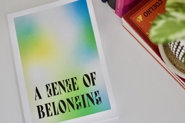 Photo of a tie-dye book cover entitled "A Sense of Belonging"