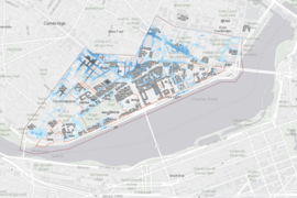 A street map of the MIT campus and environs with potential flood depths colored in deepening shades of blue