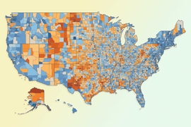 A map shows United States counties in dark blue through dark red.  Wyoming and Utah are mainly in shades of light and dark red. Vermont, Rhode Island, and California are shown in shades of blue.