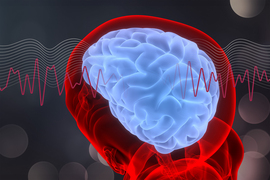 Glowing human brain illustration with brain waves crossing through center horizontally