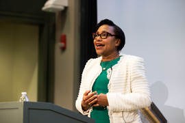 Paula Hammond speaks at podium in lecture hall