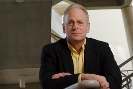 Portrait photo of John Fucillo posing on a indoor stairwell