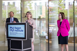 Sally Kornbluth speaking at a podium