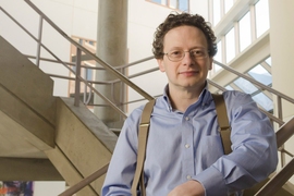 Stuart Levine poses on a stairwell