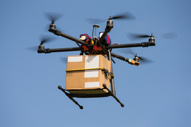 A package delivery drone in the air