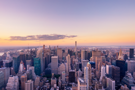 Low-altitude aerial photo of buildings in Manhattan at twilight