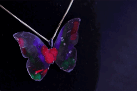 A multicolored butterfly pendant