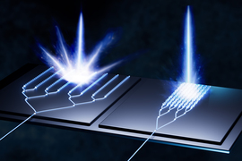 Two types of antenna; the left produces a big spark of light while the new right one has a refined beam of light.