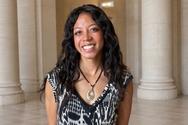 Portrait photo of Krystal Montgomery in front of some columns