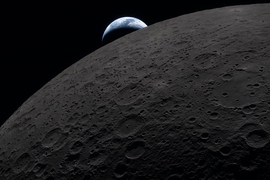 Earth sets behind the moon as seen from the Artemis II Orion spacecraft.