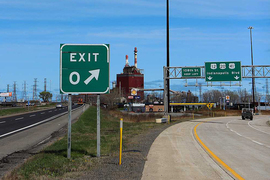 Road sign saying "Exit 0"