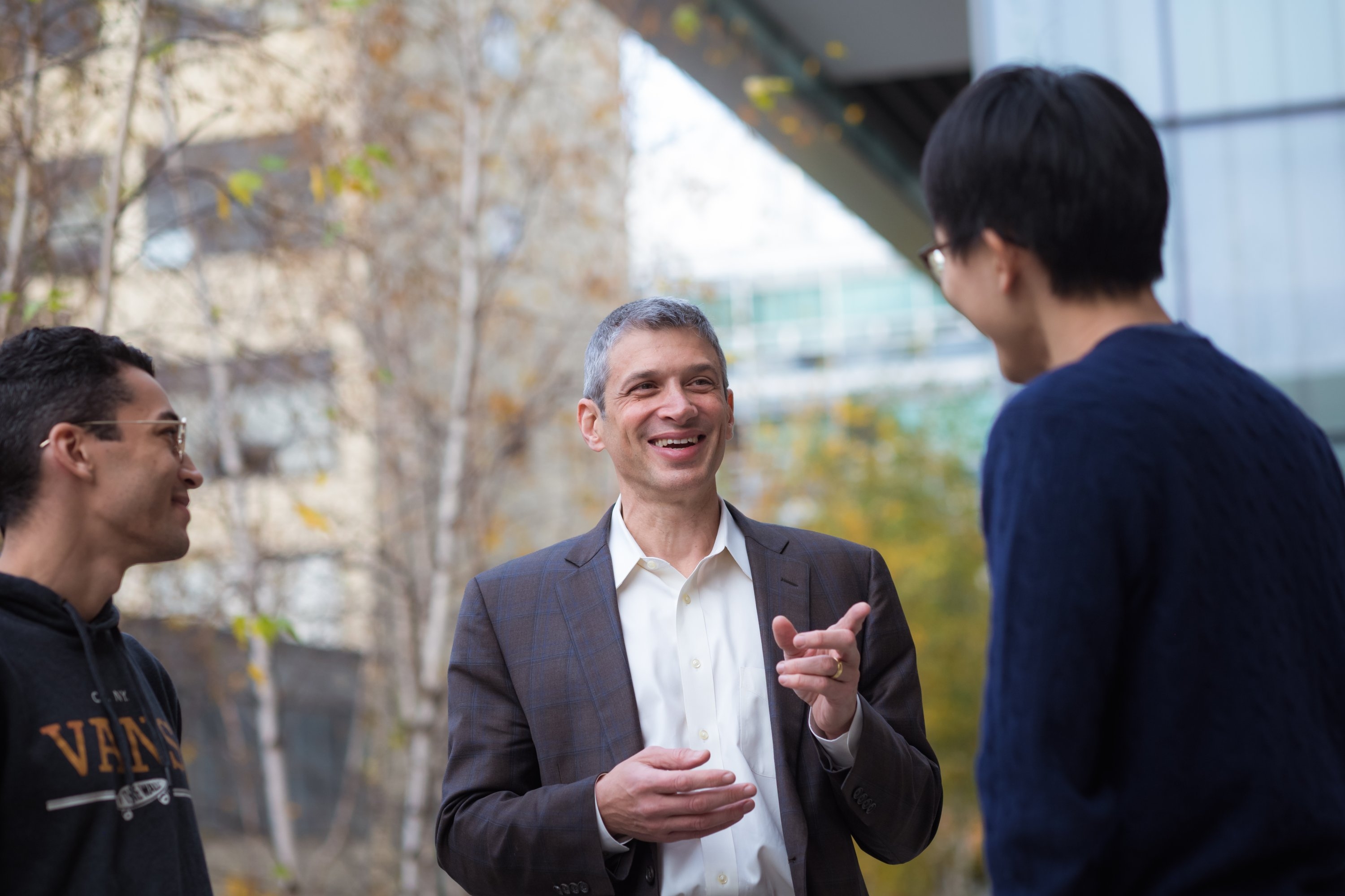 Jeff Grossman (center) with two of his graduate students