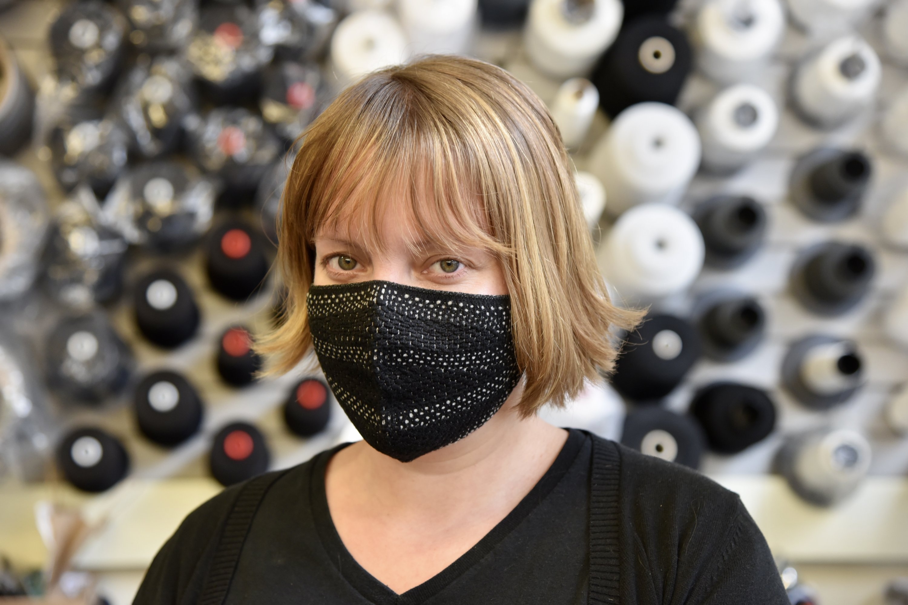 Doctoral candidate Lavender Tessmer wears a mask she customized for herself. Her paper outlining instructions to create customizable masks was awarded top honors by the Association for Computer Aided Design in Architecture.