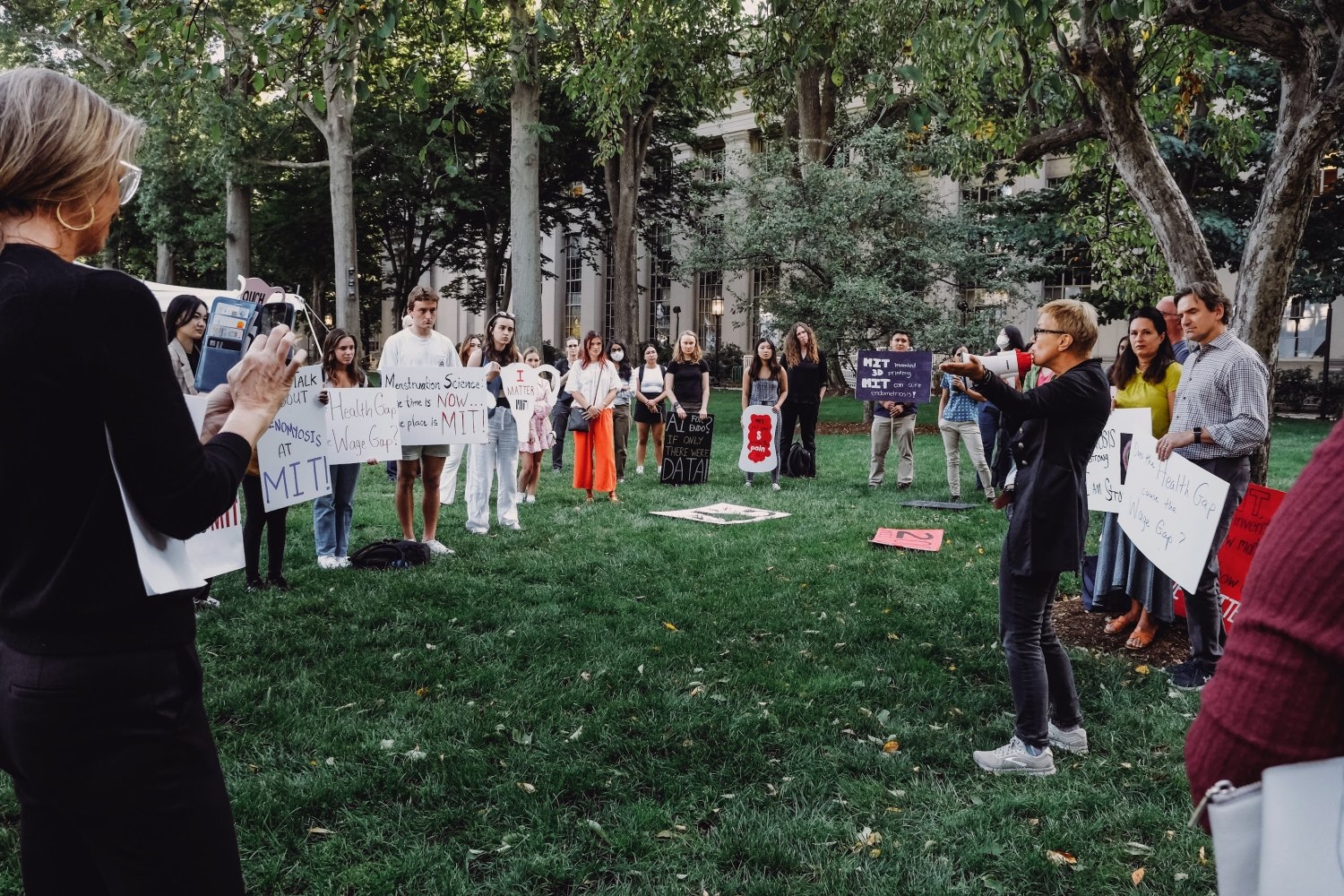 Professor Linda Griffith addresses rally attendees at the Stand Up and Be Counted event on Killian Court.