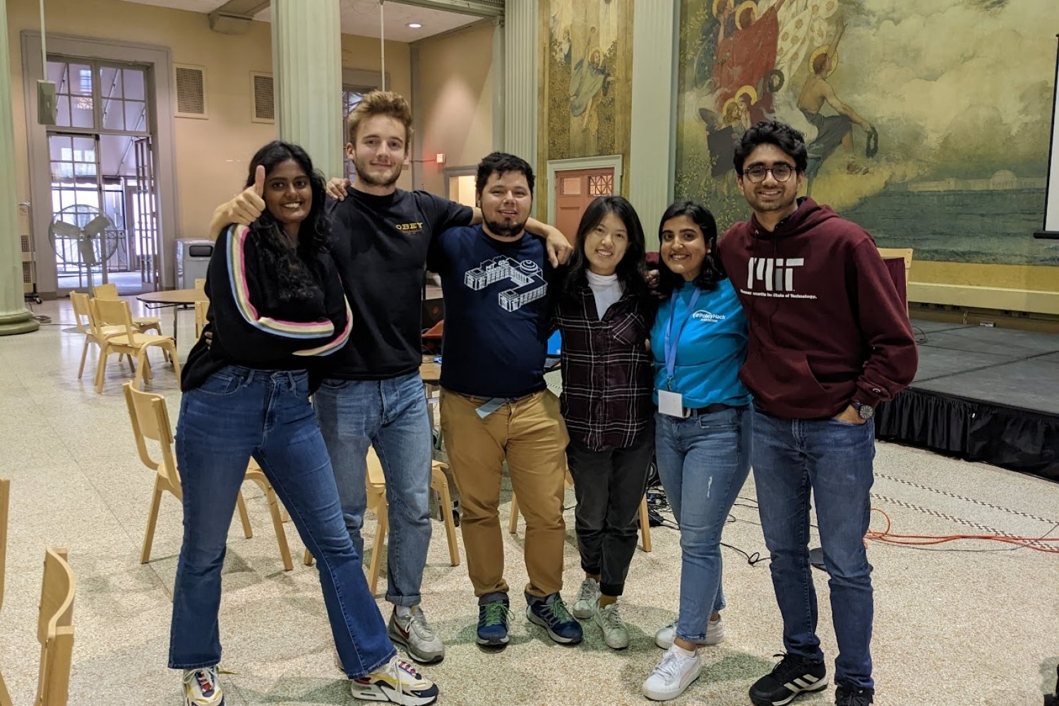 Some of the IDSS students who organized the MIT Policy Hackathon are (from left to right): Deepika Raman, Adrien Concordel, Jorge Sandoval, Aurora Zhang, Pragya Neupane, and Nirmal Bhatt.
