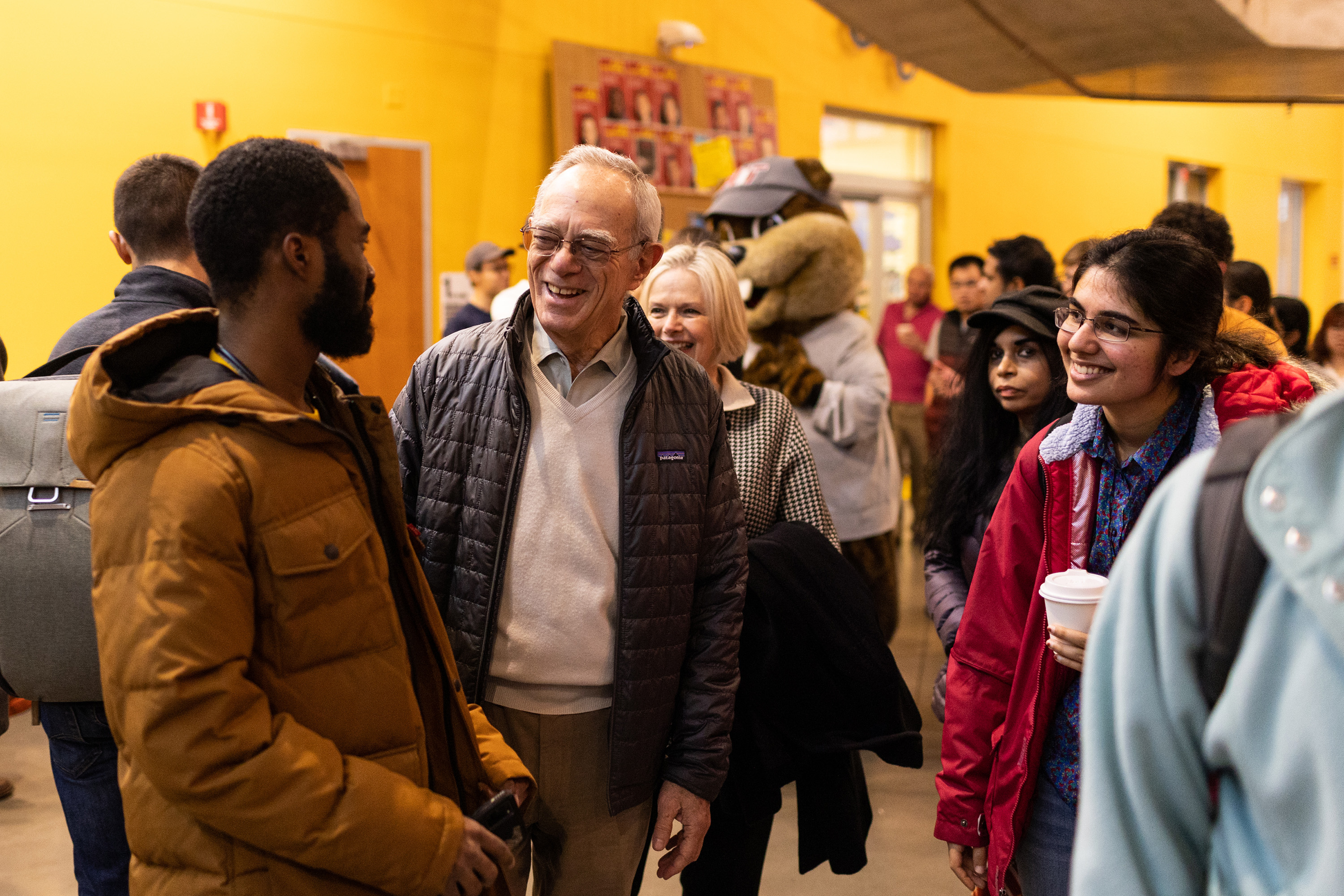 MIT President L. Rafael Reif mingled with community members at Winterfest, held in the Stata Center and the first floor of the David H. Koch Institute for Integrative Cancer Research.