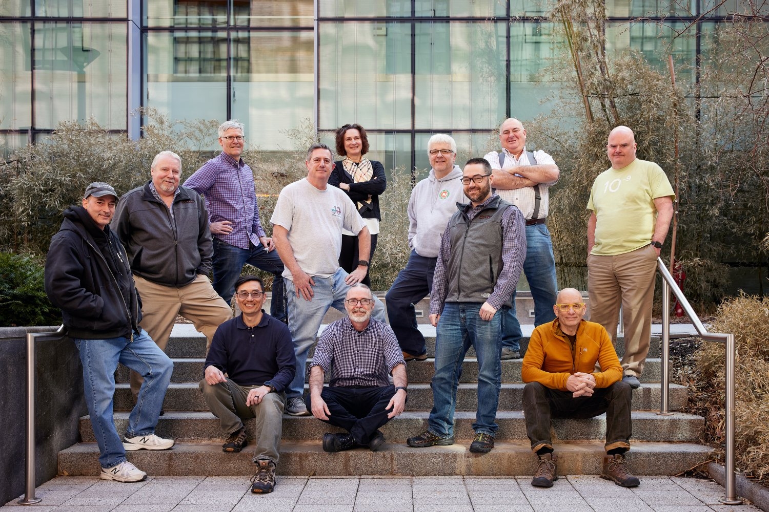 A core team of MIT technical staff moved along with tools and instruments to MIT.nano when it opened in 2018, bring with them more than 400 combined years of technical experience. Among the group are (standing, left to right) Scott Poesse, Paul Tierney, Kurt Broderick, Dave Terry, Luda Leoparde, Jim Daley, Kristofor Payer, Dan Adams, and Dennis Ward; (seated, left to right) Eric Lim, Donal Jamieson, and Mark Mondol.
