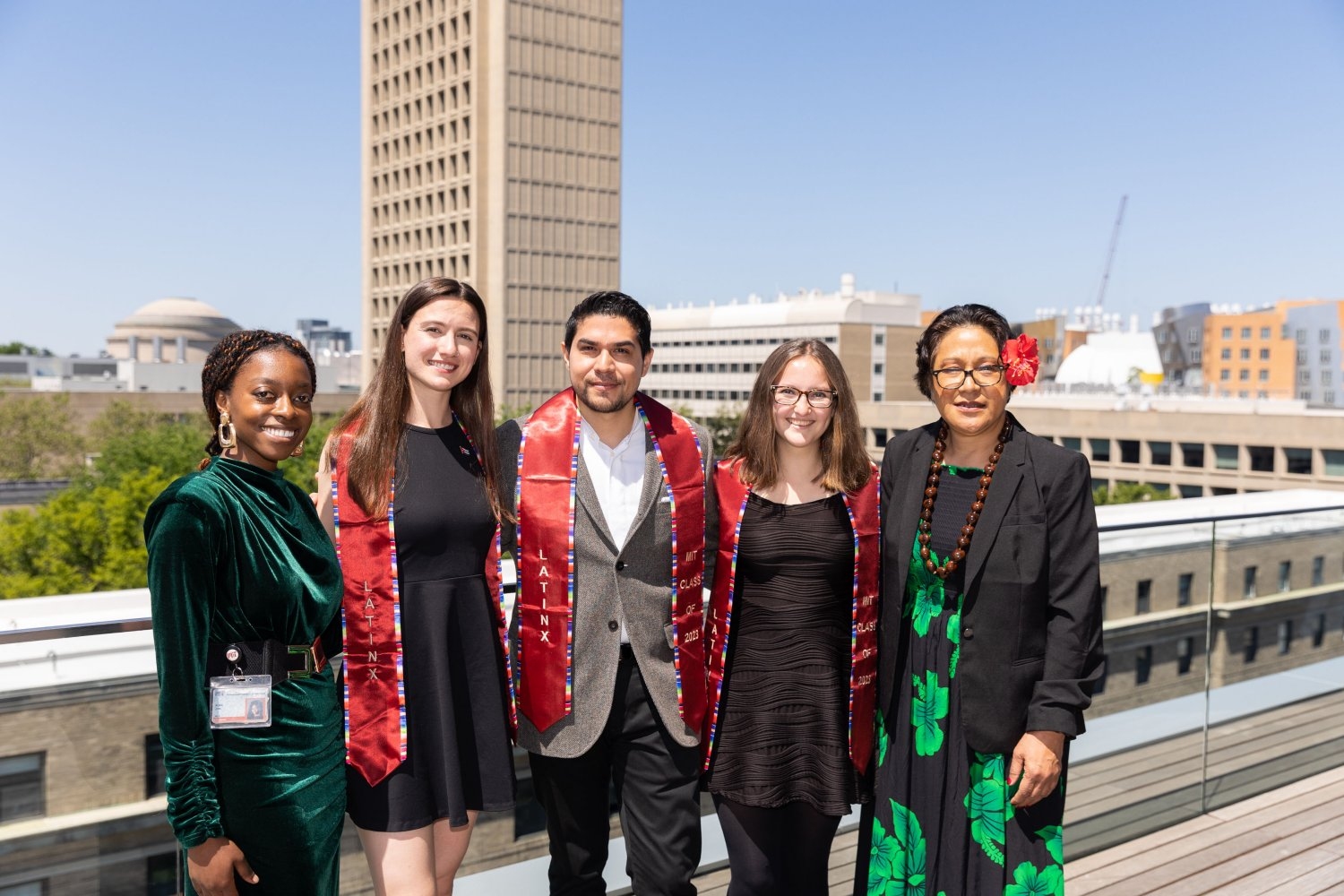 The inaugural MIT Latinx Graduation was held May 31 at the Media Lab. Seen here, left to right: Alma Jam, assistant director of intercultural engagement; Veronica Perdomo, vice president of the Latino Cultural Center (LCC); Albert Fernandez, president of the Latinx Graduate Students Association; Isabella Salinas, president of the LCC; and Moana Bentin, senior associate director of identity-based alumni communities.