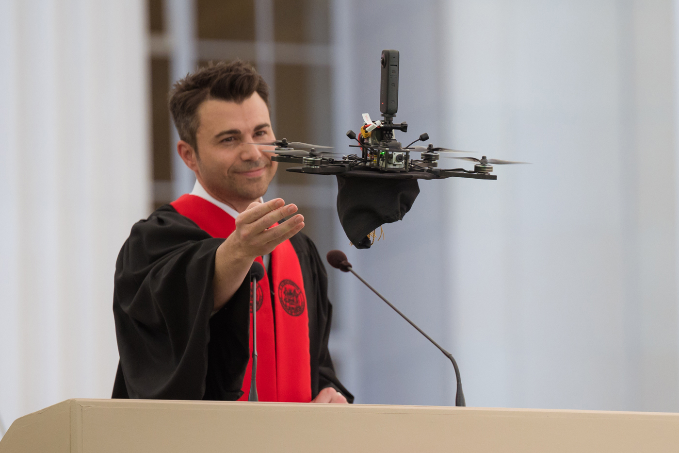 After his 2023 Commencement address, Mark Rober affixed his mortarboard to a drone and sent it soaring over the Great Dome. His remarks and grand finale drew a standing ovation from the crowd.