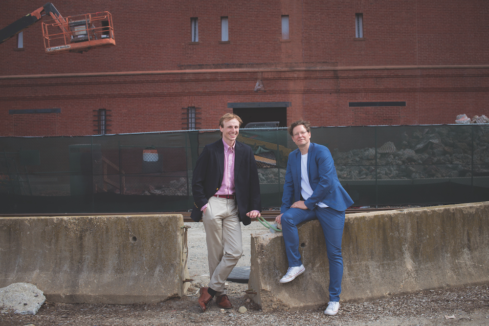 PhD candidate Zachary Berzolla SM ’21 (left), Professor Christoph Reinhart (right), and their colleagues have launched online simulation tools that enable urban policymakers to determine what building-retrofit incentives and other measures are needed to bring about a targeted reduction in their city’s carbon emissions. 