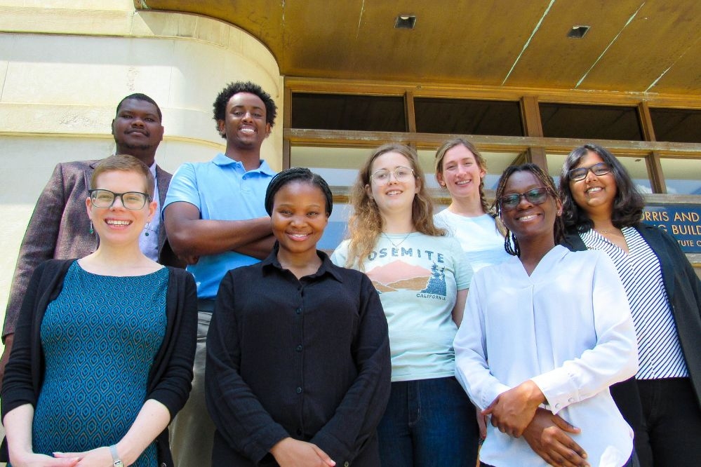 (Front row, left to right) Associate Professor Ariel White, Sikelelwe Mtshizana, and Yvonne Afi Ilupeju. (Back row, left to right) Mohammed Bah, Khalid Ali, Autumn Green, MIT Political Science Security Studies student Miriam Hinthorn, and Saumyaa Gupta.  
