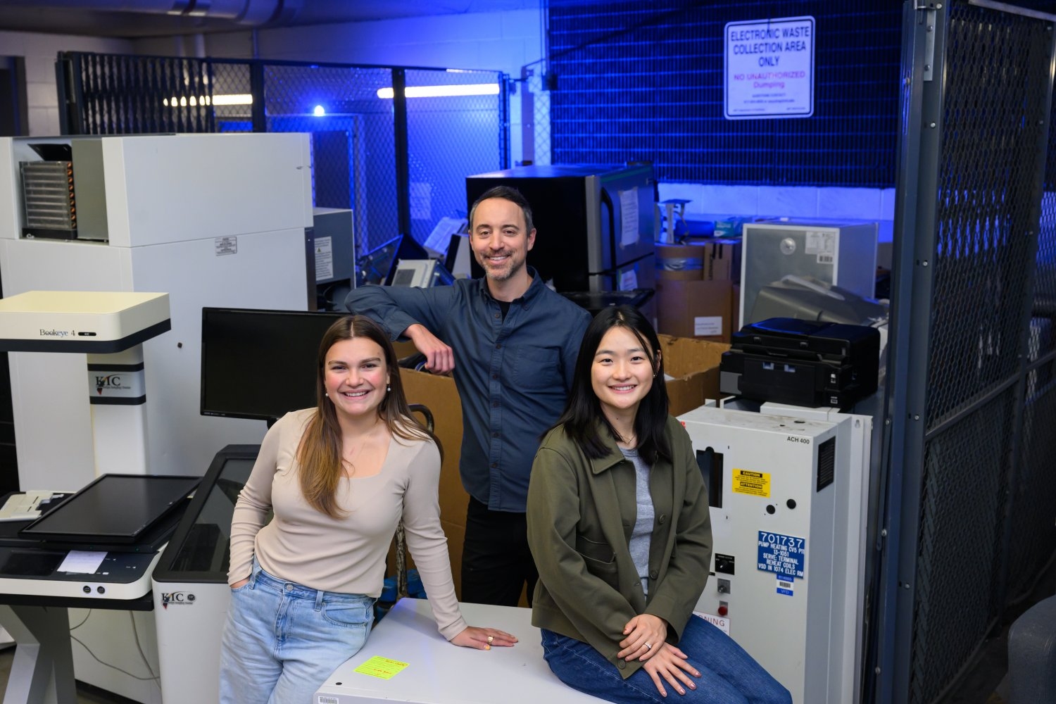 Left to right: Anastasia Duncan, Chris Rabe, and Jasmin Liu stand at the loading dock of MIT's Stata Center, where students and faculty go