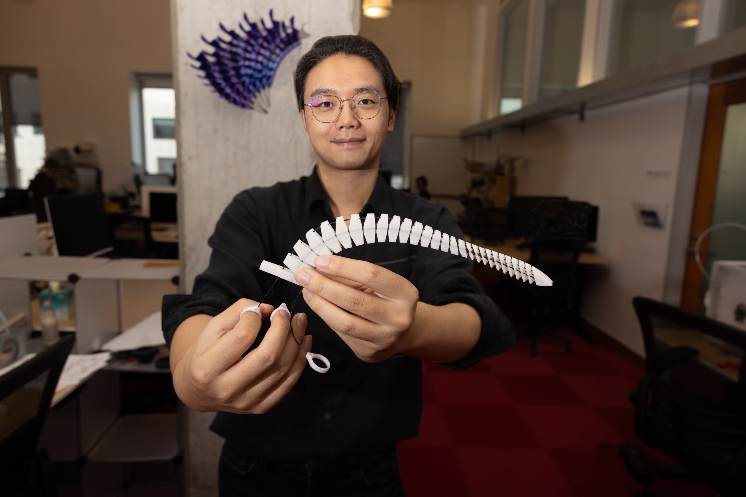 The “Xstrings” method can produce a range of colorful and unique objects, like a white tentacle that curls around items and a purple wall sculpture that can open and close.