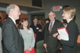 Institute Professor Phillip A. Sharp (left), director of the new McGovern Institute for Brain Research at MIT, chats with Elizabeth McGovern, daughter of Patrick McGovern Jr.; President Charles M. Vest; and Michelle Harp, daughter of Lore Harp McGovern.