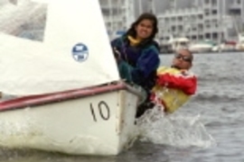 Madhulika Jain (left) and Alan Sun practice in their Flying Junior out on Boston Harbor.