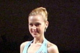 Senior Erika Ebbel smiles after placing third  in the 2002 Miss Massachusetts contest.